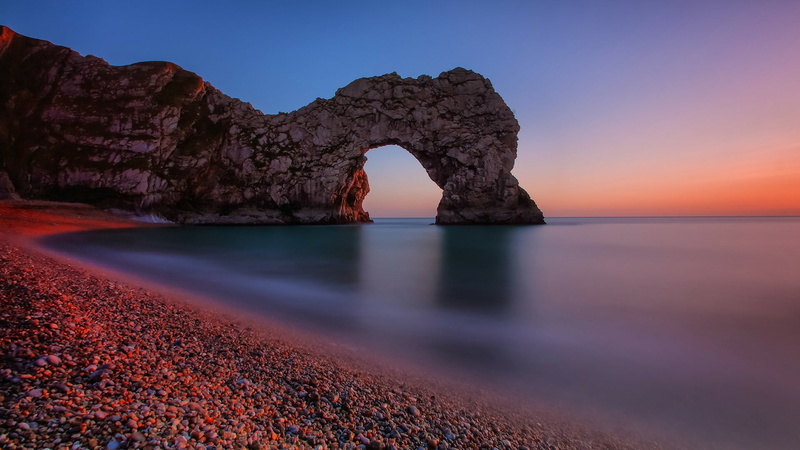 arch, headland, clear sky, gb, stack, rock, coast, sunset, scenics - nature, horizon, no people, evening, terrain, sundown, dusk, beauty in nature, cliff