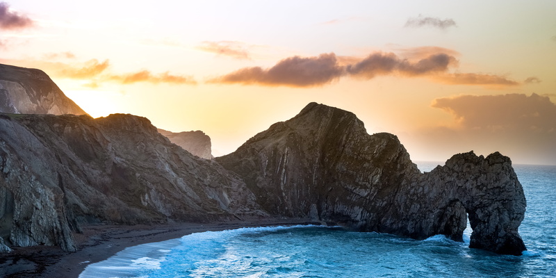 landscape, travel destinations, mountain, layered, tranquility, environment, sunset, promontory, rock - object, water, tranquil scene, view, durdle door