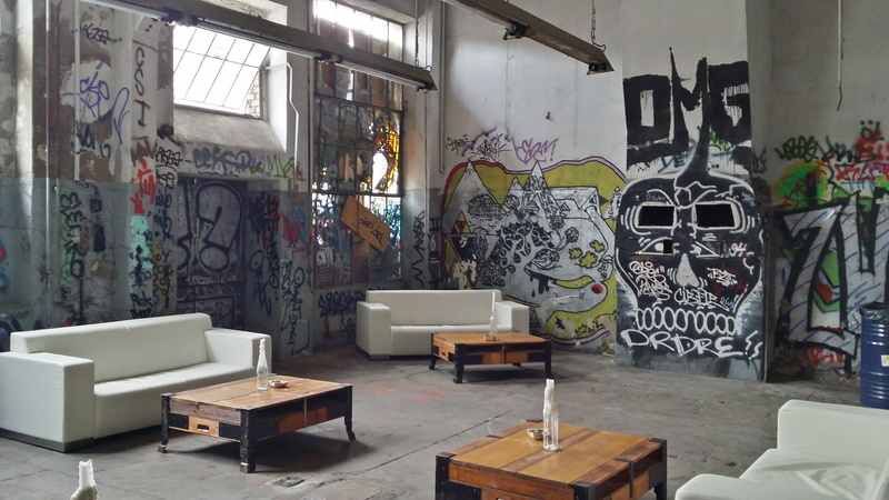 wall - building feature, set, wall, art and craft, day, absence, leather, human representation, window, street art, spray, white, furniture, run down, factory building