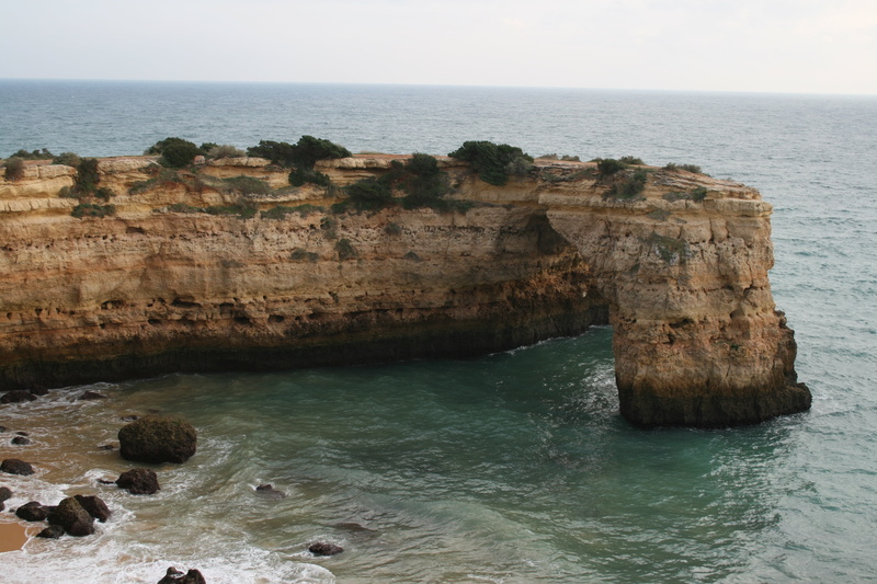 sky, water, tranquility, horizon over water, beauty in nature, day, horizon, algarve, scenics - nature, rock formation, natural arch, no people, rock, nature