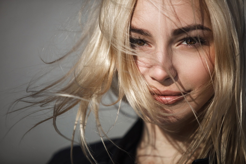 lifestyles, indoors, smiling, tousled hair, looking at camera, portrait, long hair, blond hair, human face, young adult, closeup, young women, headshot