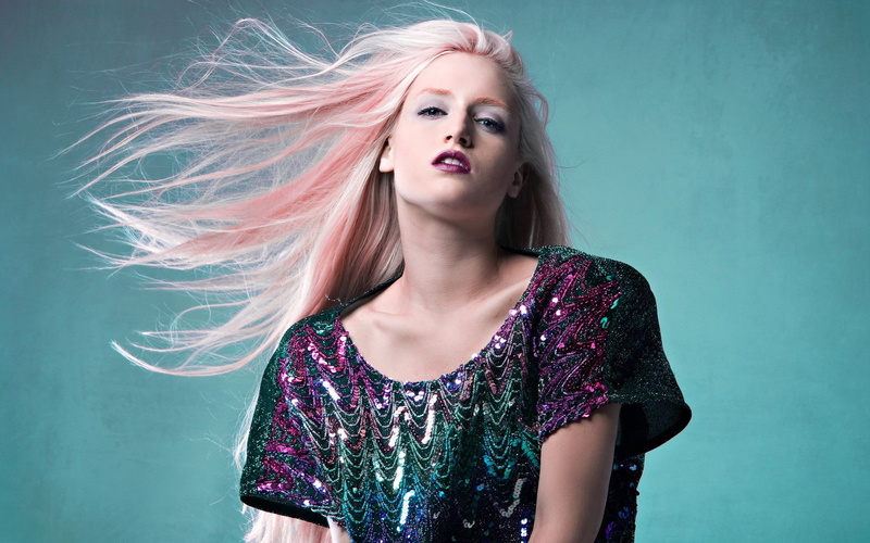 model, fashion, colored background, hairstyle, adult, dyed hair, women, front view, blond hair, wind, one person, hair, indoors, studio shot, contemplation