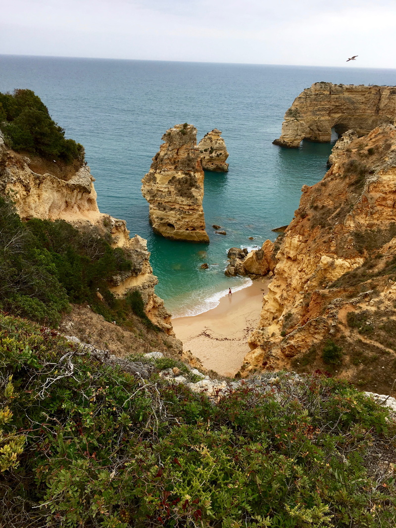 no people, water, sea, high angle view, beach, praia da marinha, solid, tranquil scene, portugal, outdoors, rocky coastline, land, rock formation, sky