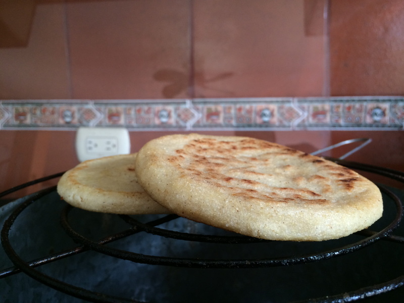 healthy eating, heat - temperature, arepas, indoors, domestic room, indulgence, wellbeing, food, snack, table, corn, edible, appliance, high angle view