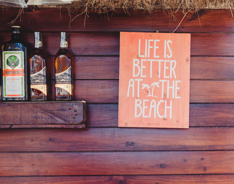 beach, life, bottles, no people, liquor, outdoors, bottle, near, brand, western script, assorted, built structure, 4K, wood, window, wall, hanging, whiskey