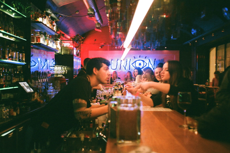 illuminated, happy hour, party, men, women, sitting, two people, night, adults, business, communication, drink, nightlife, club, glass, restaurant, adult