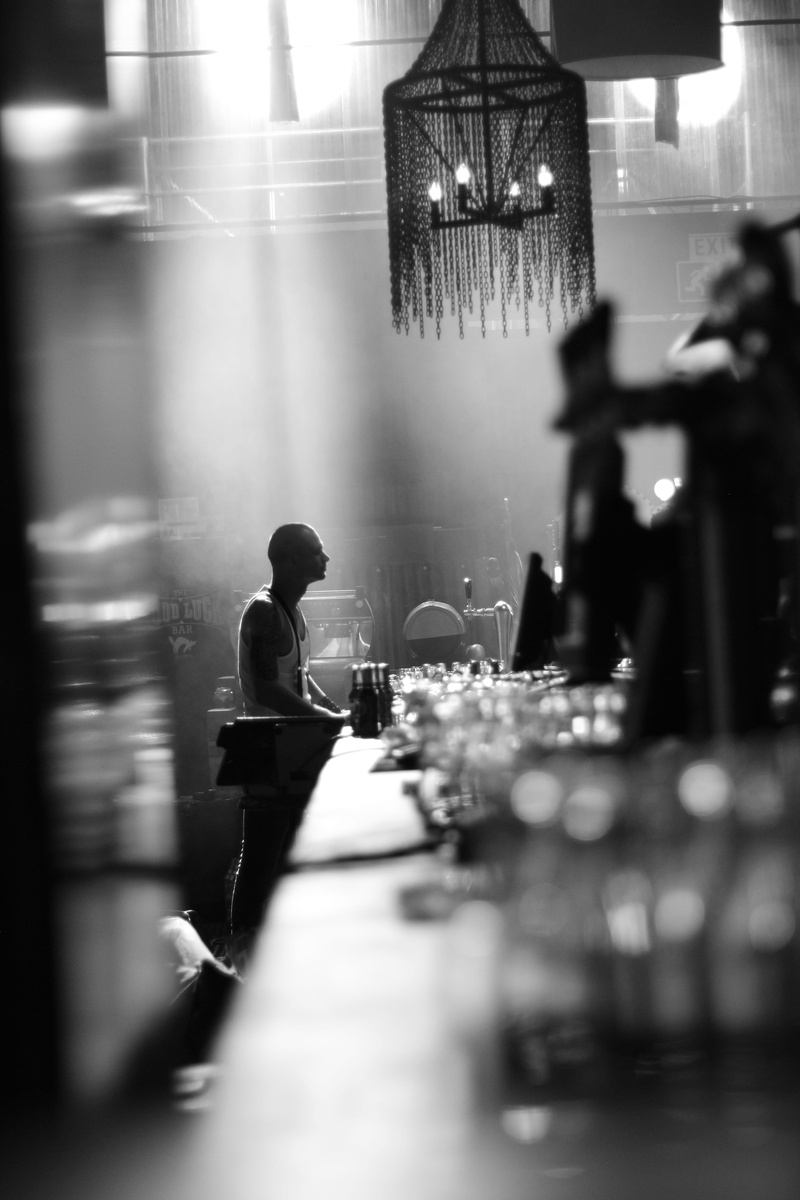 event, lighting equipment, cafeteria, meal, table, near, silhouette, adult, photography, indoors, lighting, waiter, man, glass, business, beverage, bar counter