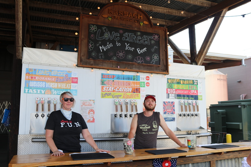 front view, looking at camera, smiling, text, standing, 5K, wood, wooden, business, refreshments, portrait, table, coworkers, young adult, service, emotion