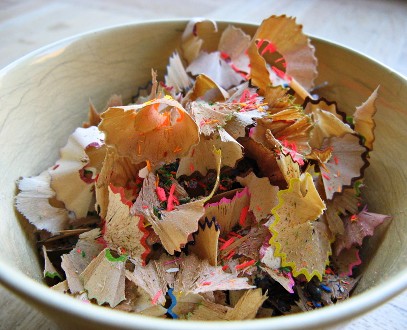 selective focus, shavings, colorful wooden pegs, high angle view, wooden pegs, spitzer, food and drink, crayons, freshness, waste, plate, pens, ready-to-eat