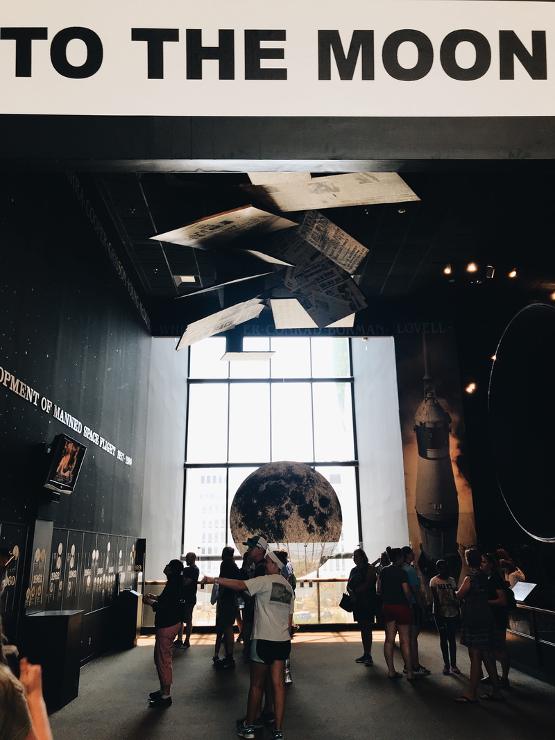 space museum, real people, built structure, group of people, moon, women, space, people, to the moon, group, standing, indoors, architecture, day, business