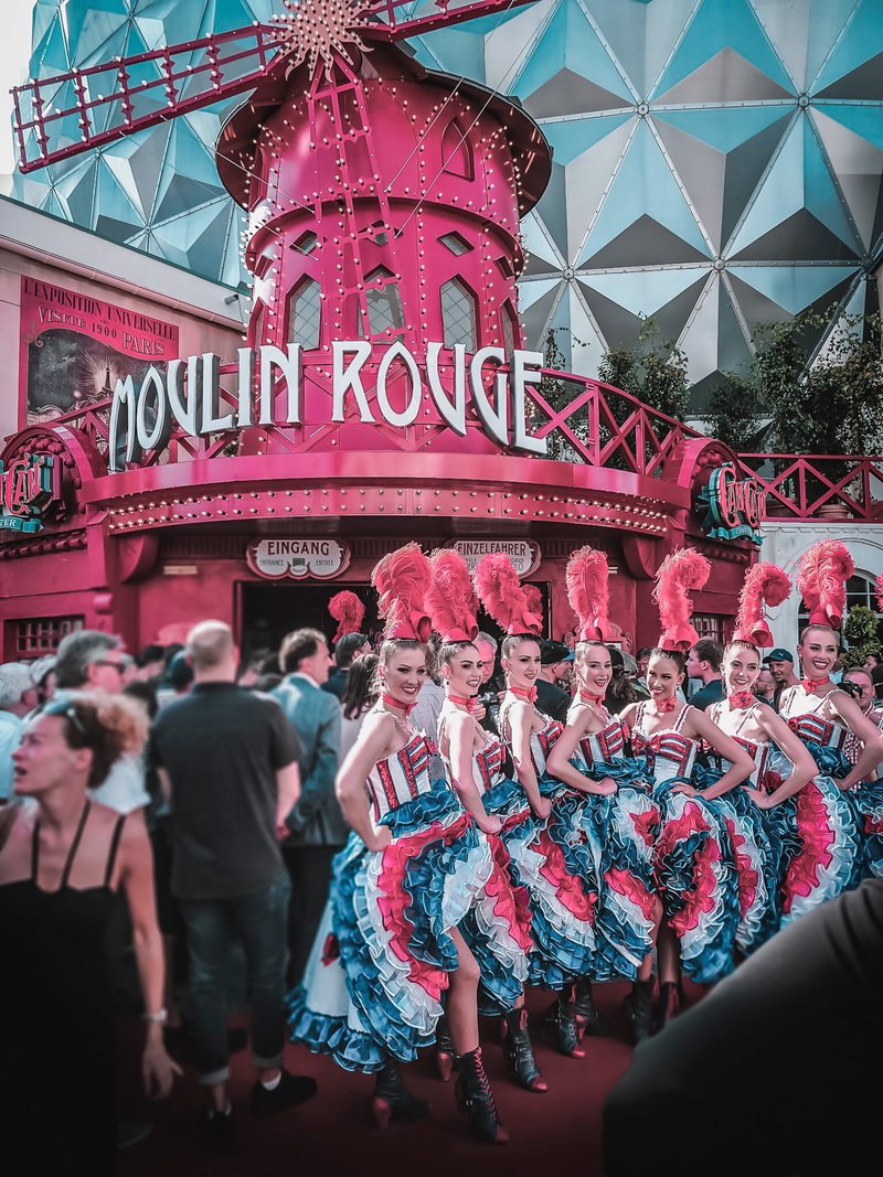 text, men, city, germany, crowd, rust (europa-park), rust, architecture, french cancan, red, celebration, vintage, event, women, leisure activity, building exterior