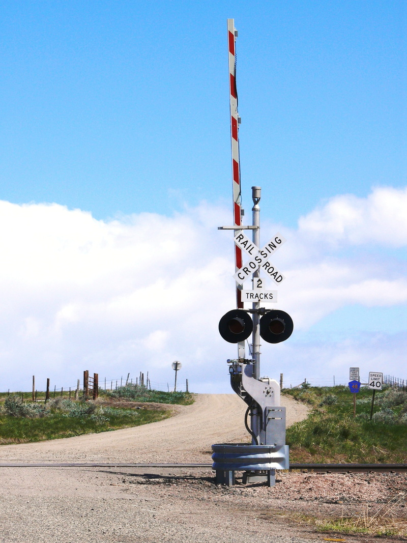 sunlight, road, text, spoorwegbomen, america, transportation, railway crossing, road sign, day, nature, sign, no people, western script, direction, railroad crossing