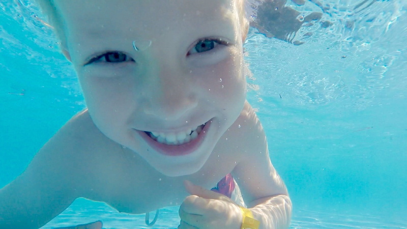 innocence, sea, real people, swimming, swim, human face, blue, smiling, offspring, pool, males, pol, childhood, water, children, happiness, portrait, nature