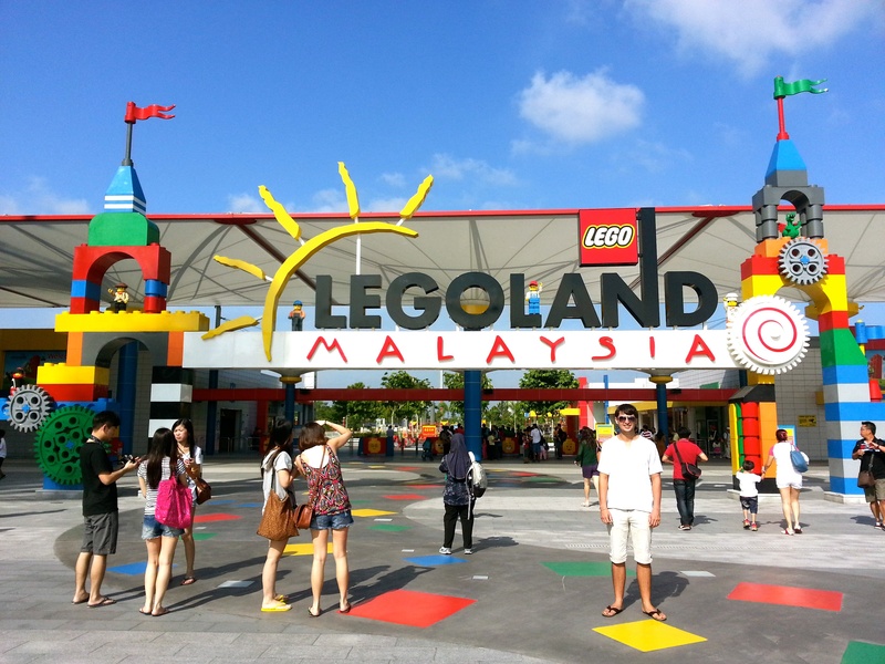 day, sign, large group of people, western script, lifestyles, lego, street, women, men, nature, amusement park, crowd, walking, 2K, outdoors, communication