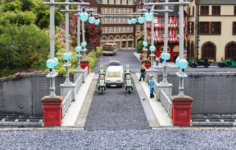 nature, city, bridge, plant, building blocks, communication, lego, street, day, built structure, outdoors, sign, toys, legoland, lego blocks, of the city