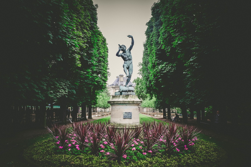 built structure, male likeness, near, green, sitting, stone, no people, flower, people, bench, man, nature, art and craft, statue, trees, water, architecture