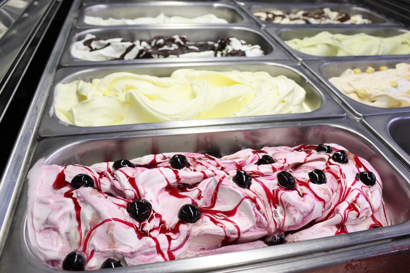 high angle view, store, unhealthy eating, flavor, chocolate, freshness, no People, candy, berry Fruit, frozen, indulgence, icing, bakery, pastry, shop
