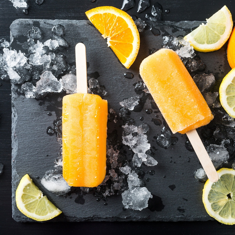 citrus fruit, sweet, ice lemons popsicle, frozen food, melting, frozen, fruit, freshness, healthy eating, high angle view, orange, dairy product, ice cream
