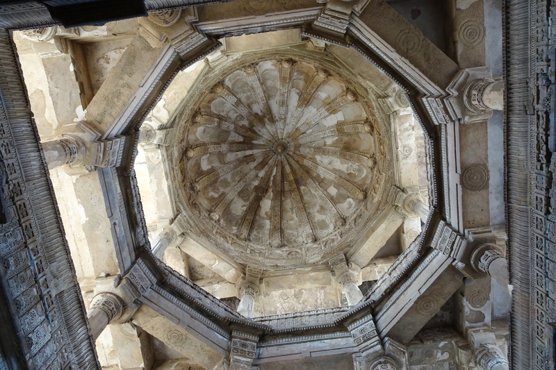 stone, travel destinations, spirituality, ceiling, low angle view, building exterior, built structure, monument, sculpture, archaeological park, india