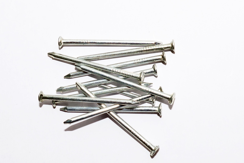 silver - metal, alloy, metallic, industry, office supply, Steel, construction, Metal, nail, hardware, studio shot, silver colored, abundance, high angle view