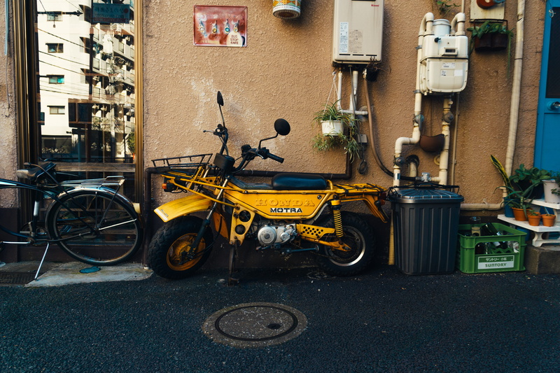 japan, mode of transportation, no people, bicycle, rotor, alloy wheel, park, wall - building feature, garage, damaged, city, land vehicle, vehicle, machine