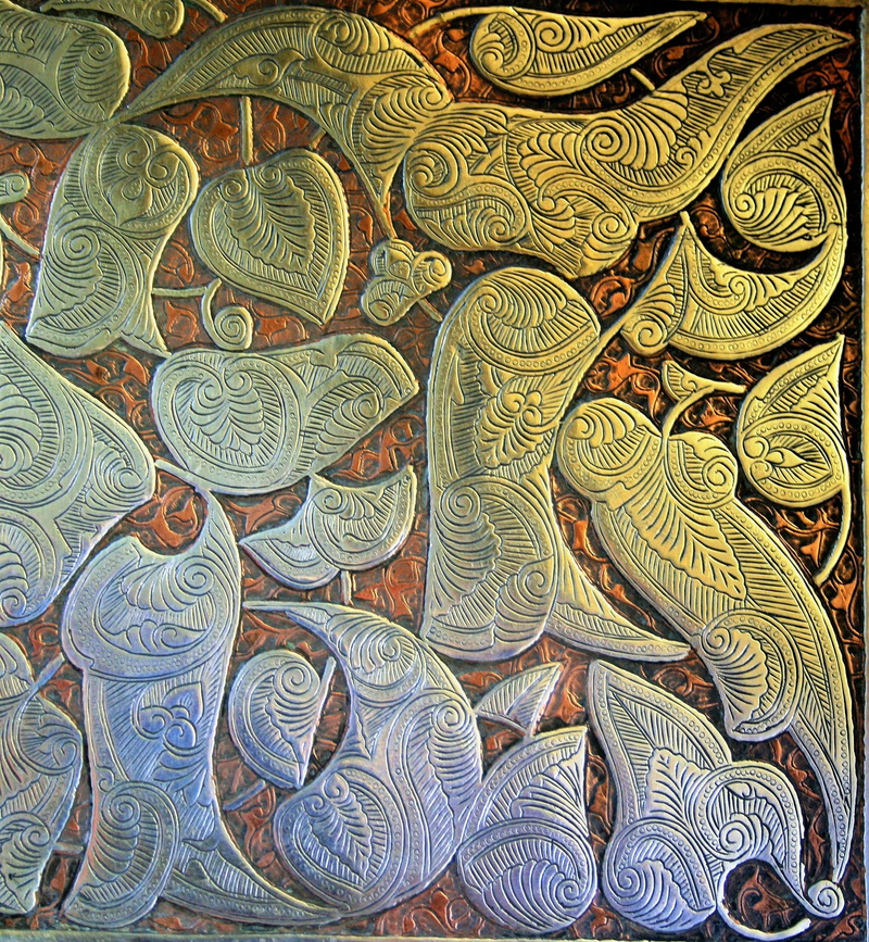 still life, representation, indoors, large group of objects, repetition, embossed, design, high angle view, abundance, metallic platter, backgrounds, creativity