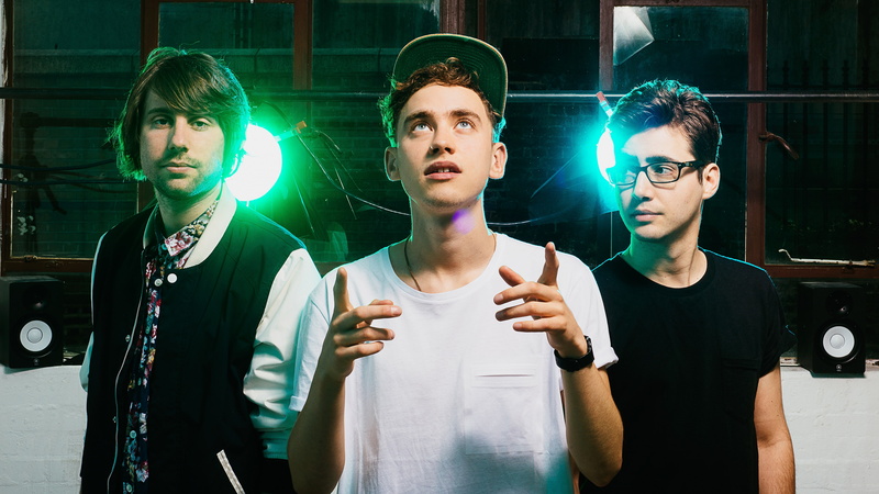 Top music artist and bands, lighting, background, jacket, Mikey Goldsworthy, near, Emre Turkmen, 5K, white, Olly Alexander, shirt, black, stage, man, men