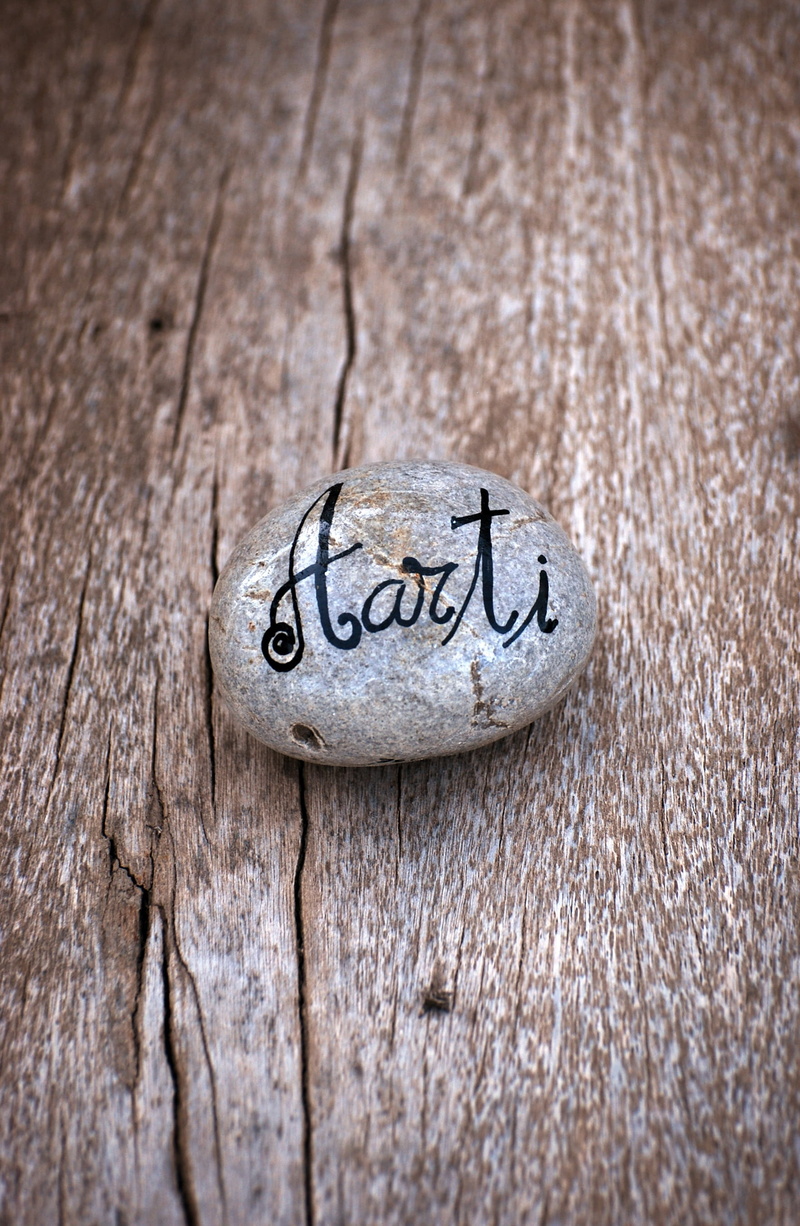 love, simplicity, Brown, Wood, western script, indoors, Stone, single word, Aarti, stone, silver colored, metal, Zen, text, celebration, zen, india, high angle view