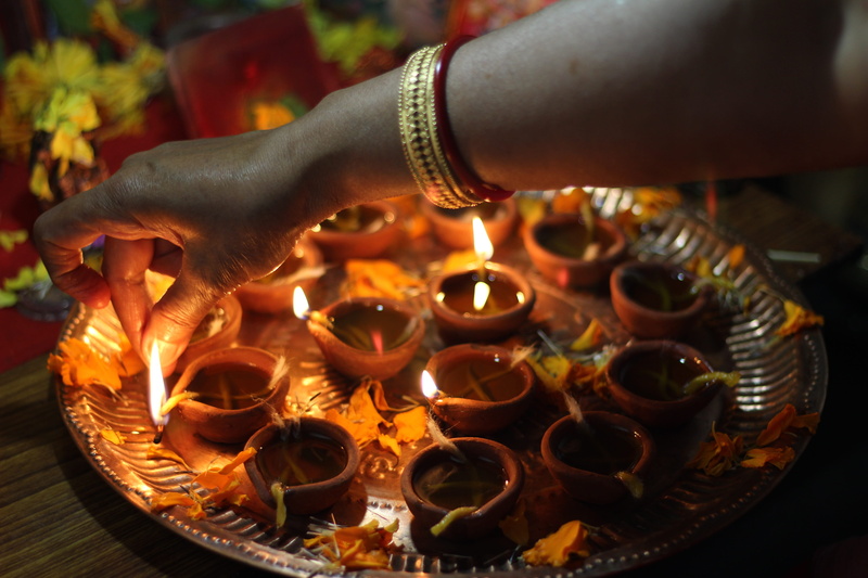 human body part, close-up, diya, electric lamp, occasion, flame, human hand, arm, 5K, celebration, fire, women, finger, holding, bracelet, traditions