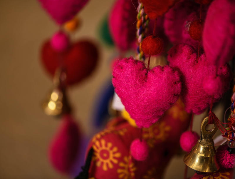 music, group of objects, musical instrument, no people, ornament, pink color, red, arts culture and entertainment, celebration, lighting, religion, indoors