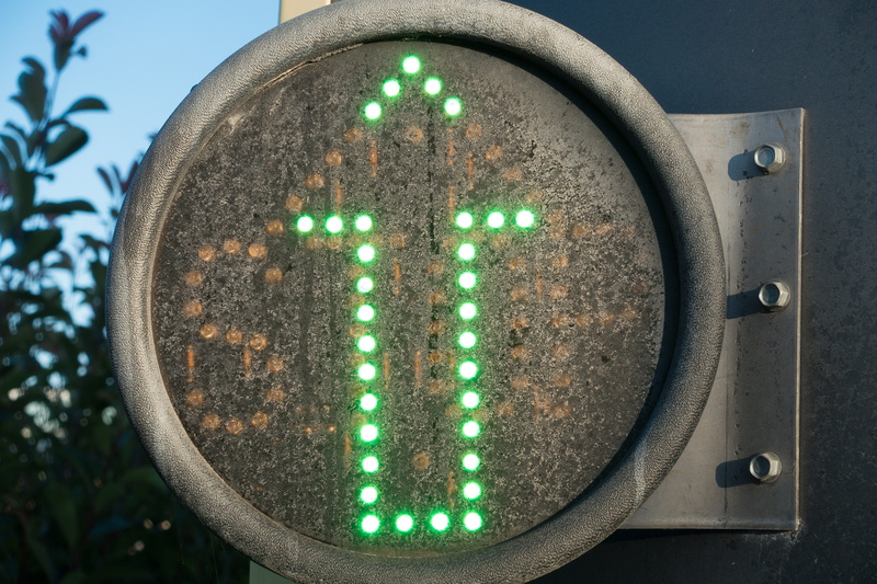 glass - material, diodes, shape, nature, outdoors, no people, technology, arrow, electricity, geometric shape, electrical equipment, car wash, metal, illuminated