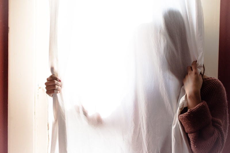 woman, inside, home interior, lifestyles, domestic room, relaxation, human limb, hiding, day, bed, human body part, semi-dress, indoors, person, room, hands