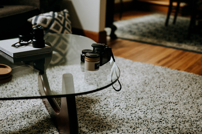 focus on foreground, camera, beside, black, aesthetic, camera - photographic equipment, interior, body, rug, arts culture and entertainment, music, moody