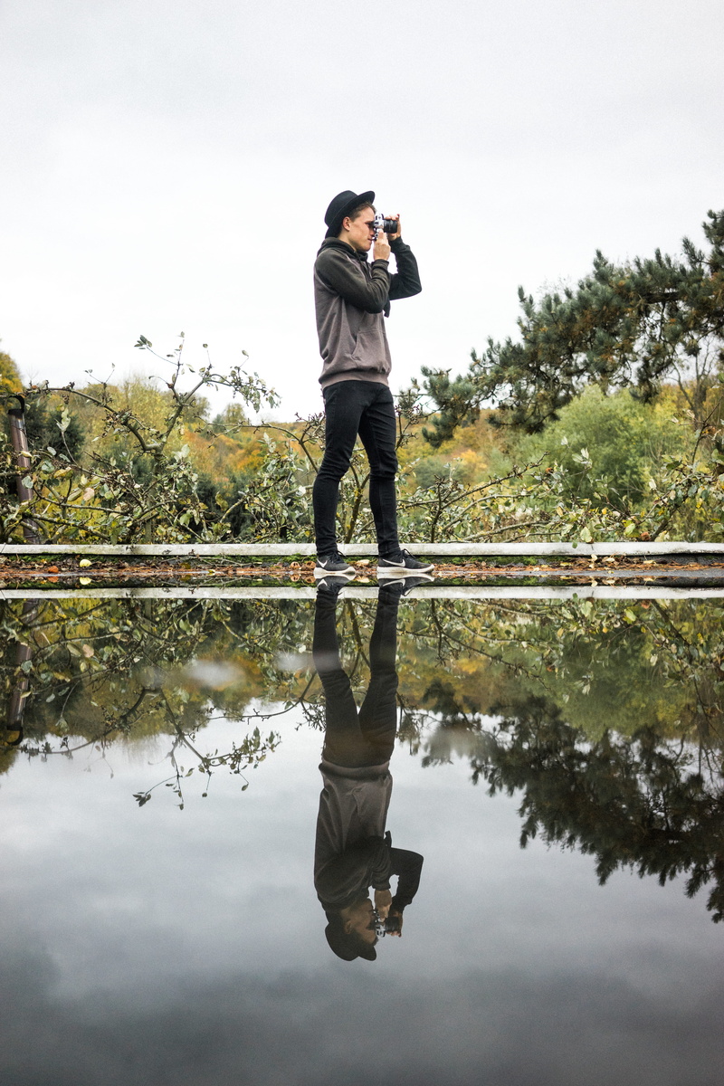 outdoors, photo, body, nature, sweatshirt, day, tree, portrait, face, using, technology, binoculars, 5K, hat, water, standing, puddle, reflection, leisure activity