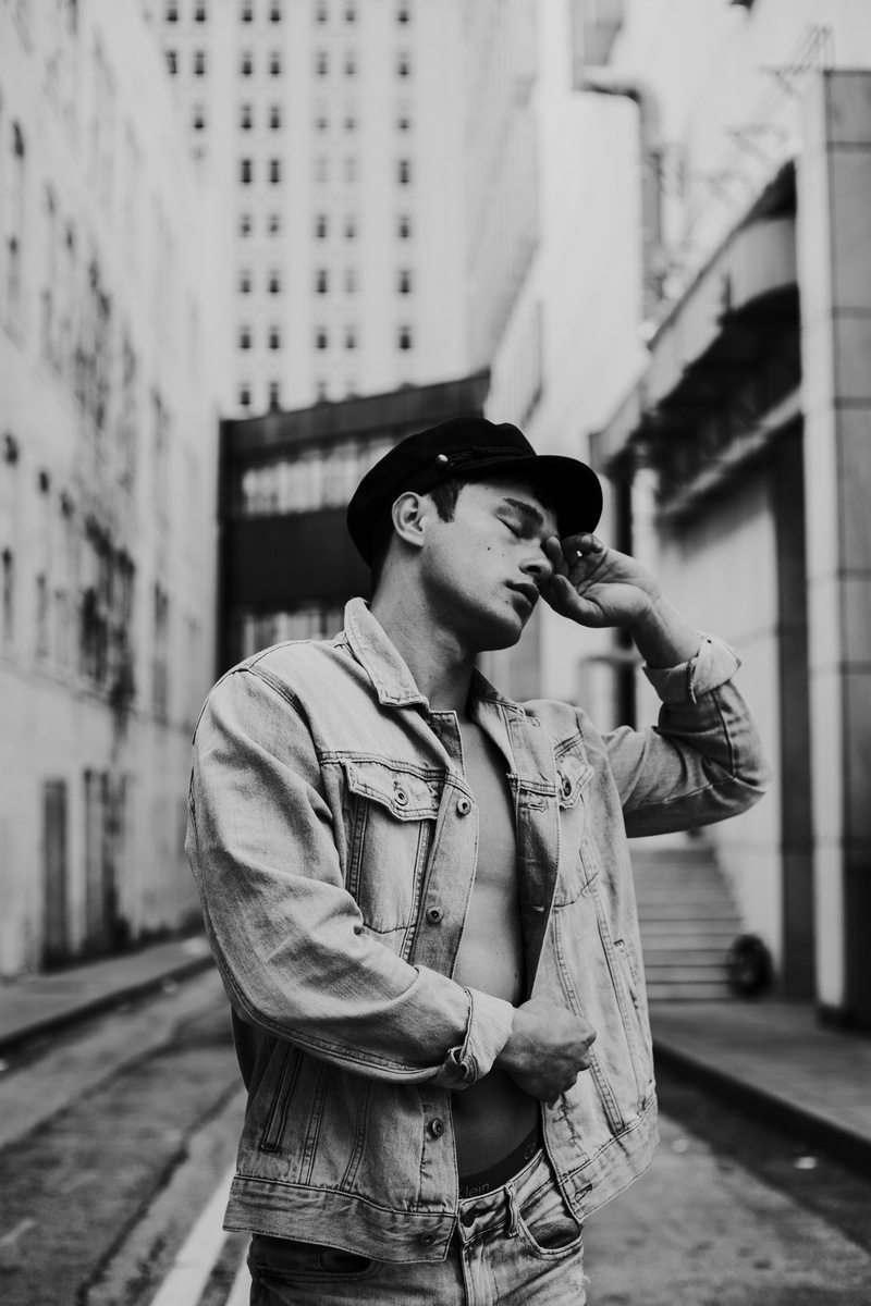 shirtless, sunglasses, grayscalled, jacket, model, lifestyles, monochrome, clothing, leisure activity, cap, one person, young men, eyes closed, bandw, glasses