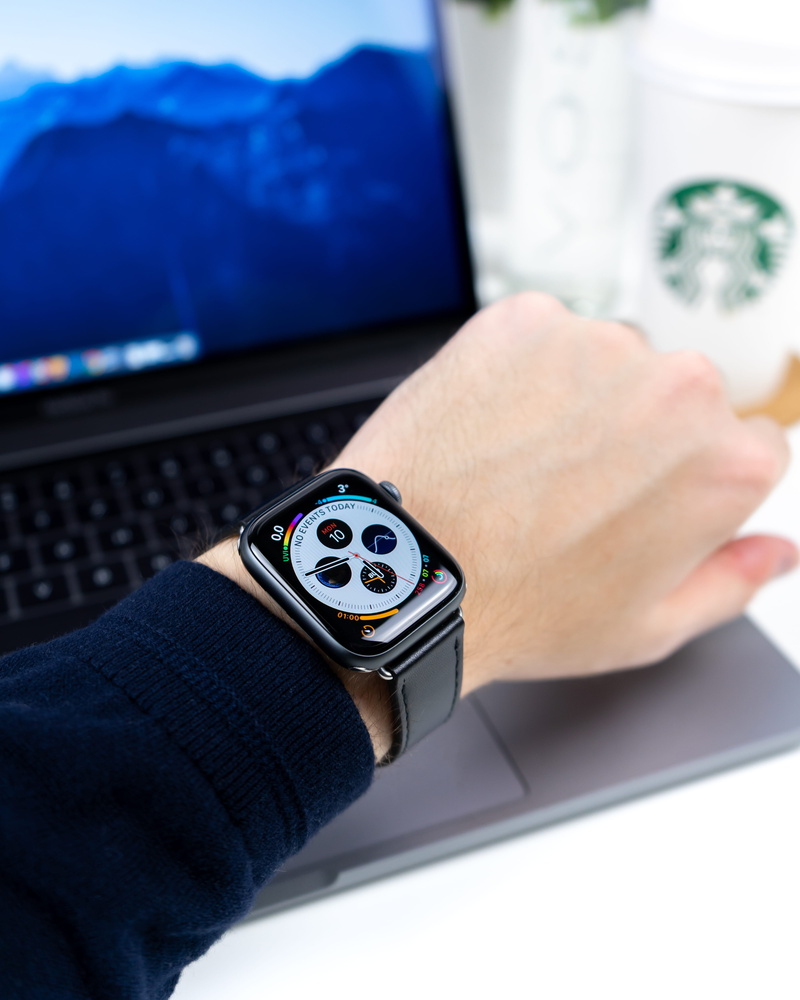 watch, focus on foreground, aluminum, person, lifestyles, personal perspective, sport, band, indoors, silver, adult, day, case, wearing, one person, black