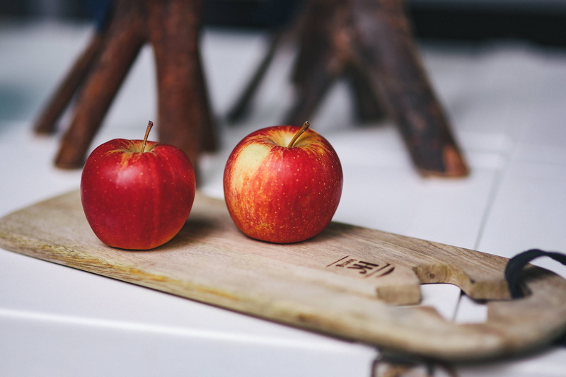 red, fruit, focus on foreground, healthy, text, table, wellbeing, selective focus, wood - Material, day, snack, close-up, cutting board, indoors, education