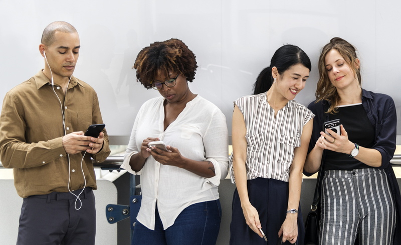young adult, information, real people, european, cellphone, technology, group of people, holding, portable information device, ethnicity, chat, american