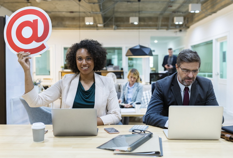 using laptop, working, cheerful, caucasian, communication, bright, connection, afro, businesswoman, technology, at sign, mug, african american, table, mature adult