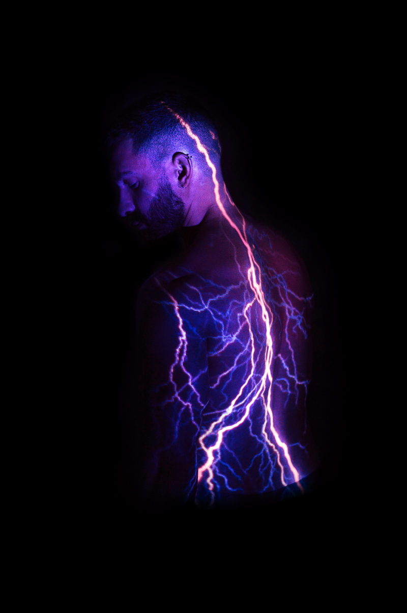 israel, young adult, human body part, blue, art, purple, indoors, edit, light - natural phenomenon, body part, adult, boy, guy, digital composite, thunder