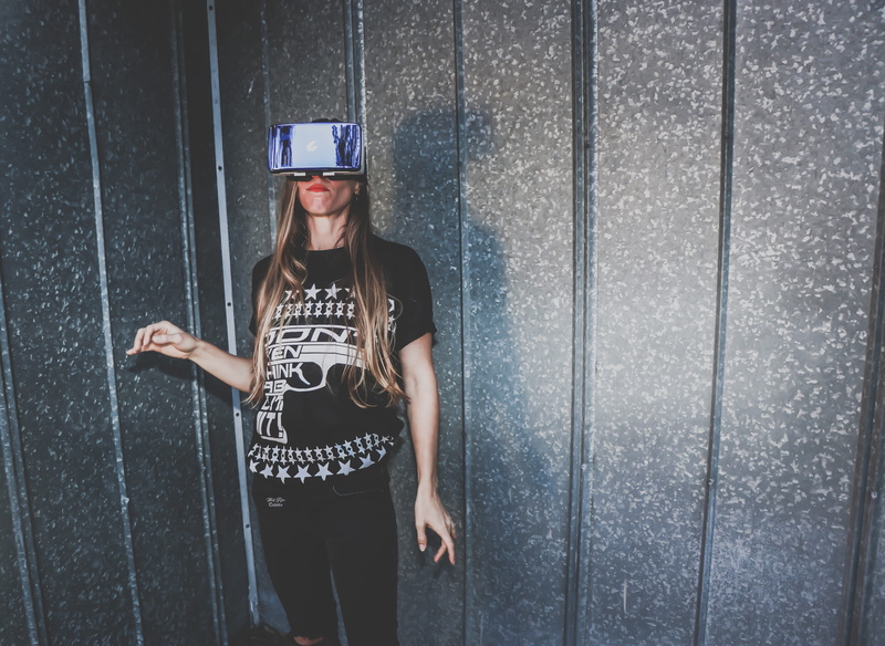 outfit, mobile phone, girl, adult, hair, photoshoot, hands, three quarter length, smart phone, technology, front view, pose, glasses, real people, wall - building feature