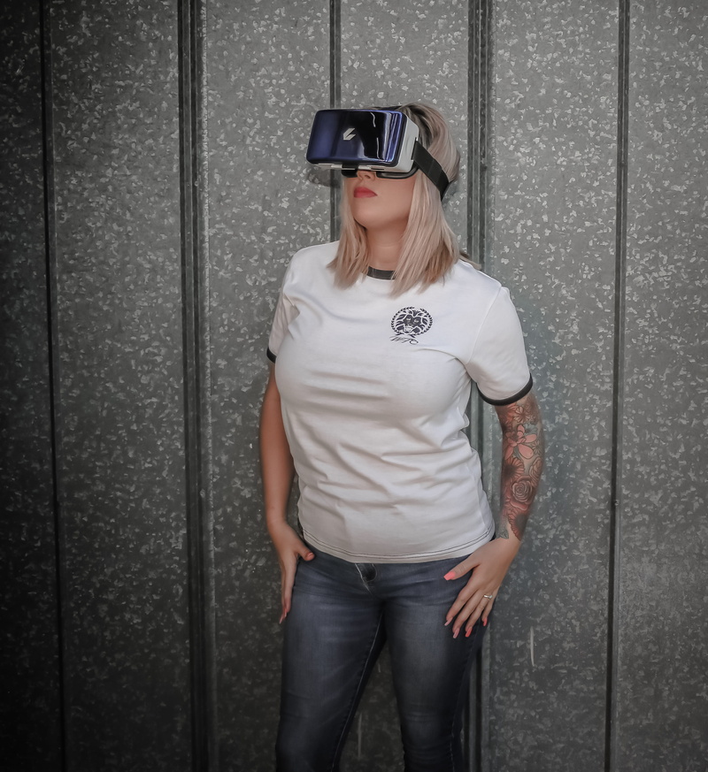 goggles, young adult, hairstyle, 2K, leisure activity, wall, wearing, female, young women, hair, technology, standing, beautiful woman, wireless technology