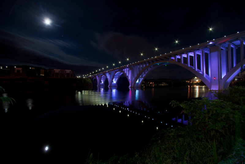 architecture, nature, nightlife, travel destinations, arch bridge, river, purple, cloud - sky, knoxville, building exterior, built structure, outdoors