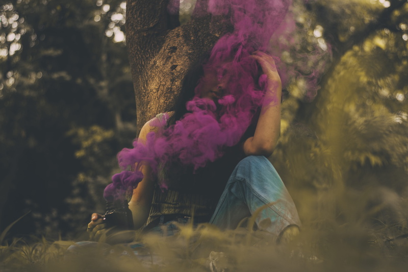 5K, hair, sitting, trees, person, wear, headshot, smoke bomb, model, grass, swirly bokeh, green, covered, smoke, one person, colours, pose, photoshoot