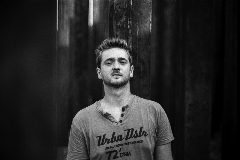 black and white, one Person, guy, henley, lifestyle, real people, person, top, waist up, beard, standing, hair, front view, s, male, man, young, lifestyles