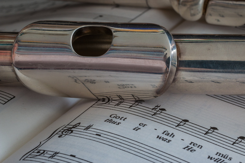 paperwork, sheet music, blueprint, sheet, plan, transverse flute, instrument, publication, indoors, table, number, still life, close-up, flute, music, document