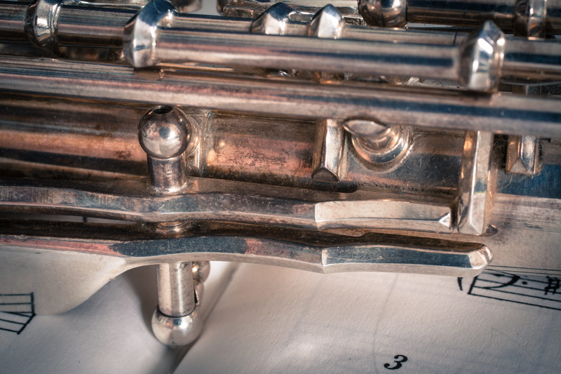 close-up, flute, arts culture and entertainment, retro styled, transverse flute, silver - metal, faucet, 2K, no people, musical instrument, still life