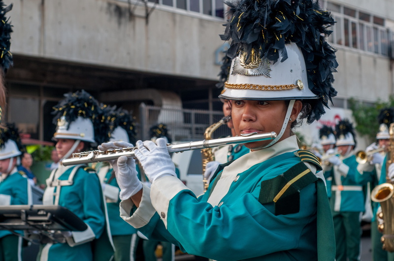 architecture, musical, women, flute, focus on foreground, young adult, clothing, real people, headwear, portrait, band, uniform, costume, parade, marching