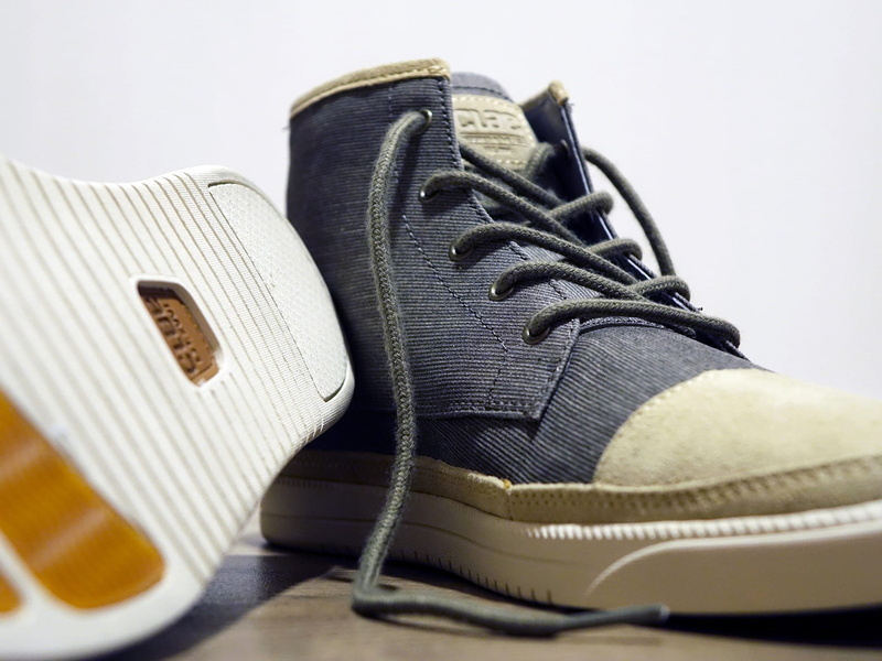 indoors, menswear, casual clothing, still life, sole of shoe, fashion, feet, no people, sports shoe, shoe, studio shot, wearable, sneaker, shoelace, brown