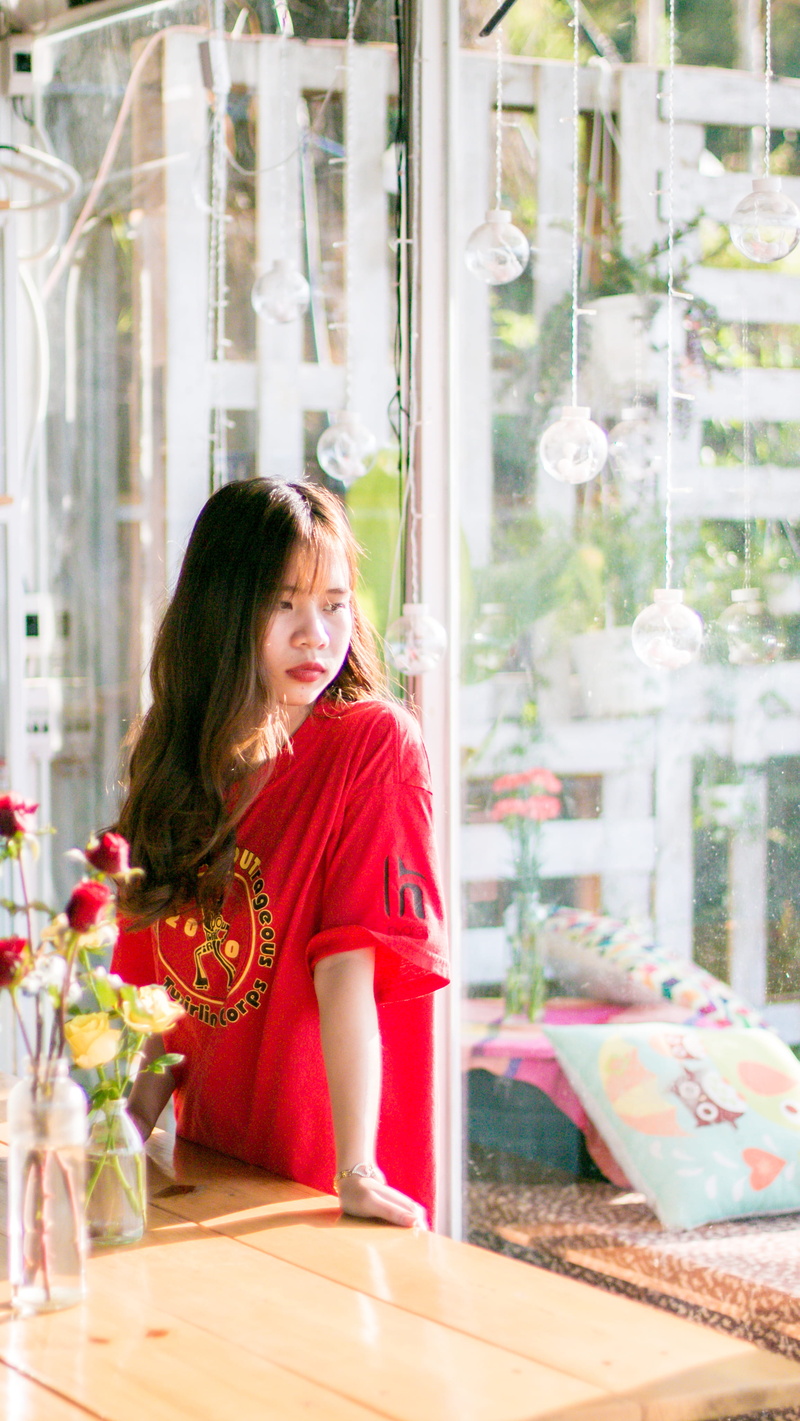 indoors, casual, beautiful woman, adult, transparent, window, lonely, young adult, hairstyle, shirt, wearing, smiling, woman, girl, pretty, sad, long hair